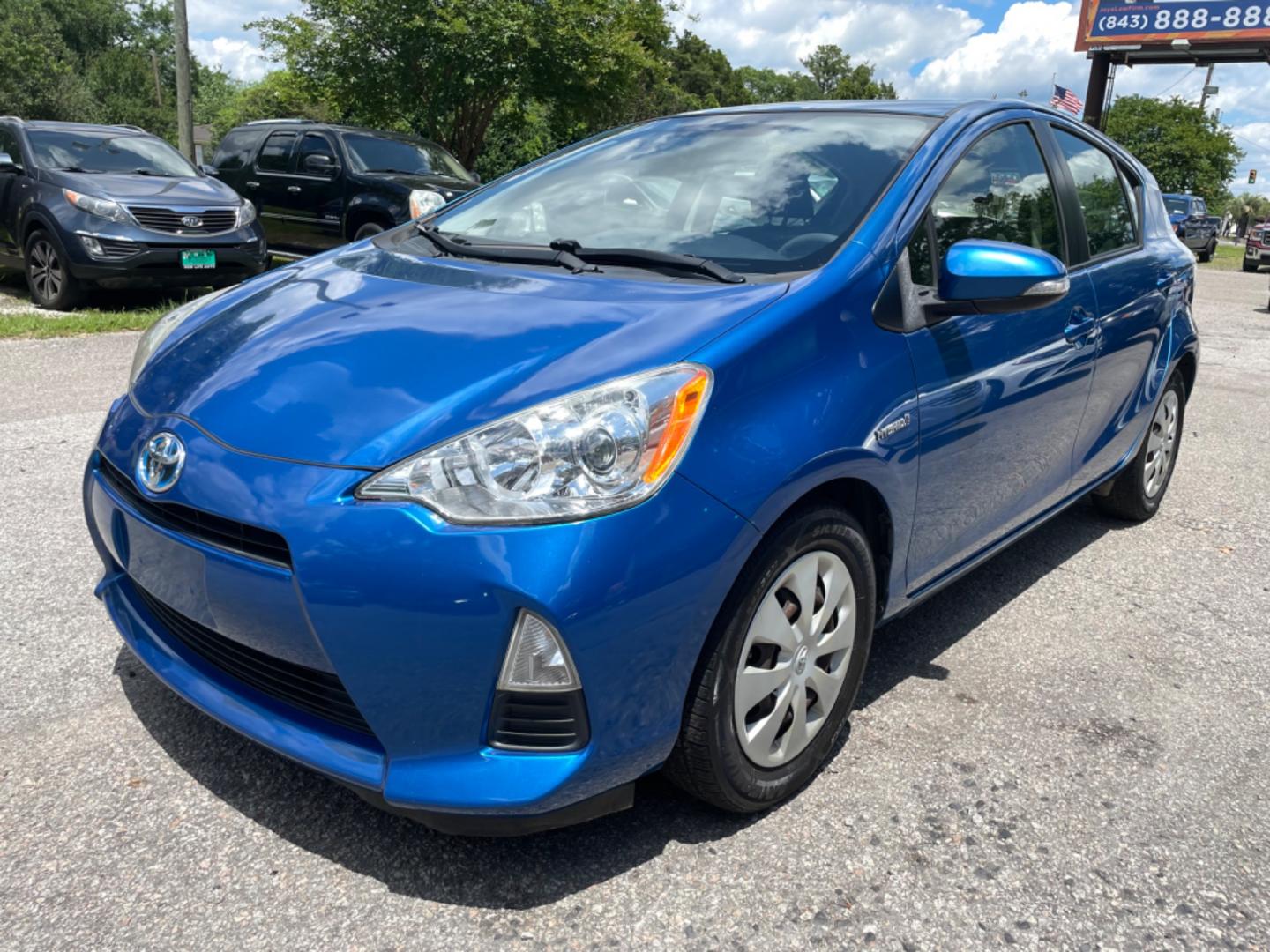 2013 BLUE TOYOTA PRIUS C ONE (JTDKDTB34D1) with an 1.5L engine, Continuously Variable transmission, located at 5103 Dorchester Rd., Charleston, SC, 29418-5607, (843) 767-1122, 36.245171, -115.228050 - Super clean interior with CD/AUX/Bluetooth, Power Windows, Power Locks, Power Mirrors, Spacious Cargo for it's size, Keyless Entry. Local Trade-in! Certified ONE Owner Vehicle!! 122k miles Located at New Life Auto Sales! 2023 WINNER for Post & Courier's Charleston's Choice Pre-owned Car Dealer AND - Photo#2